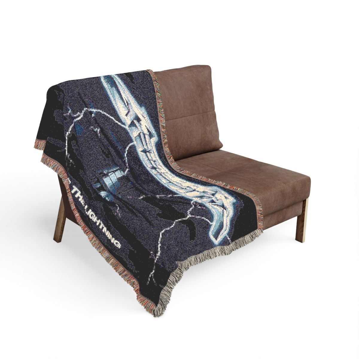 Ride the Lightning woven blanket on the sofa