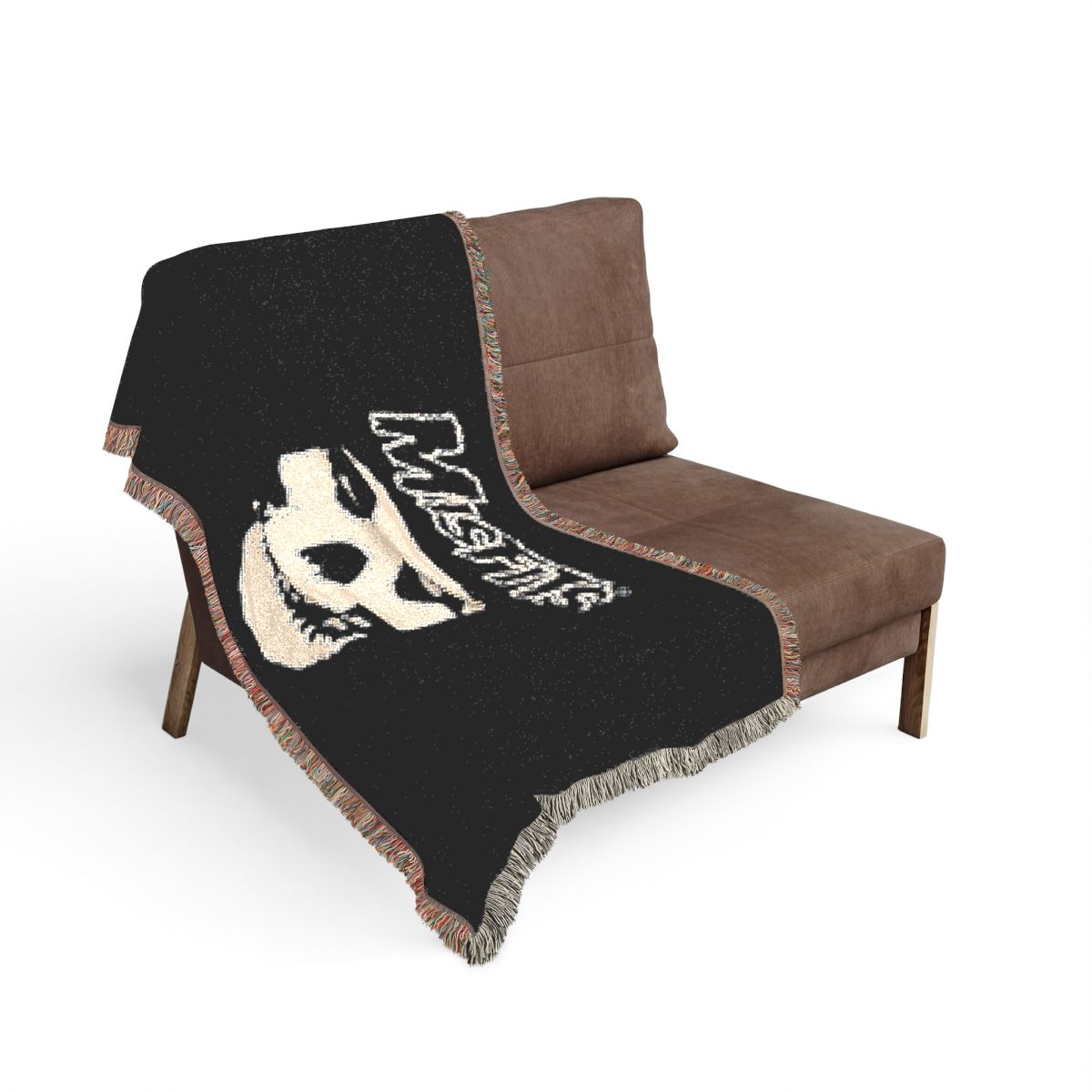 Misfits Design 2 woven blanket on the sofa
