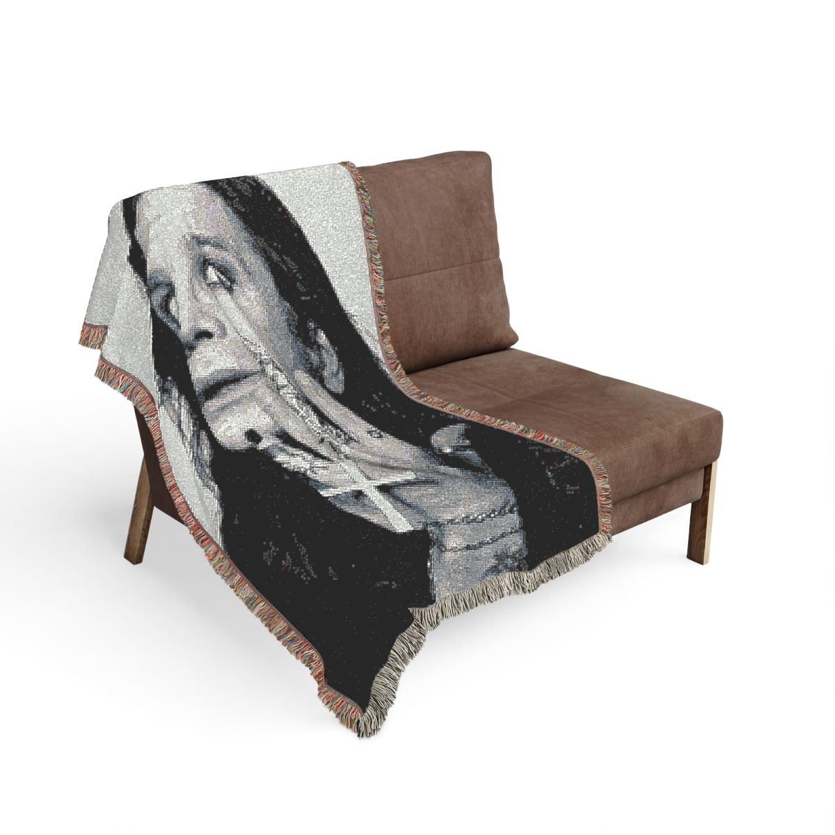 Ozzy Osbourne silver cross woven blanket on a sofa