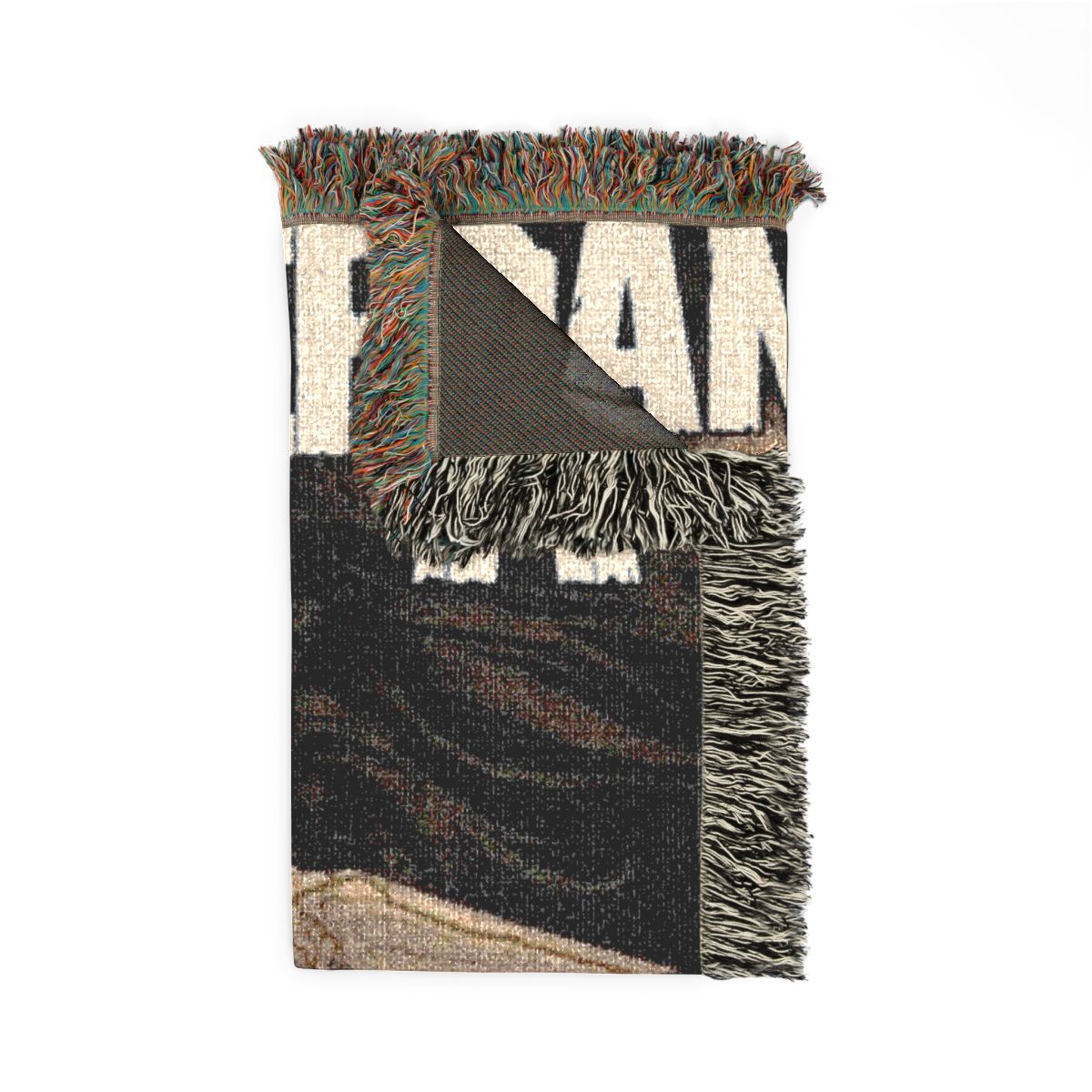 Vulgar Display of Power woven blanket folded